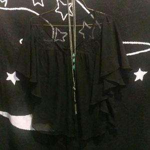 Sheer laying blouse with necklaces